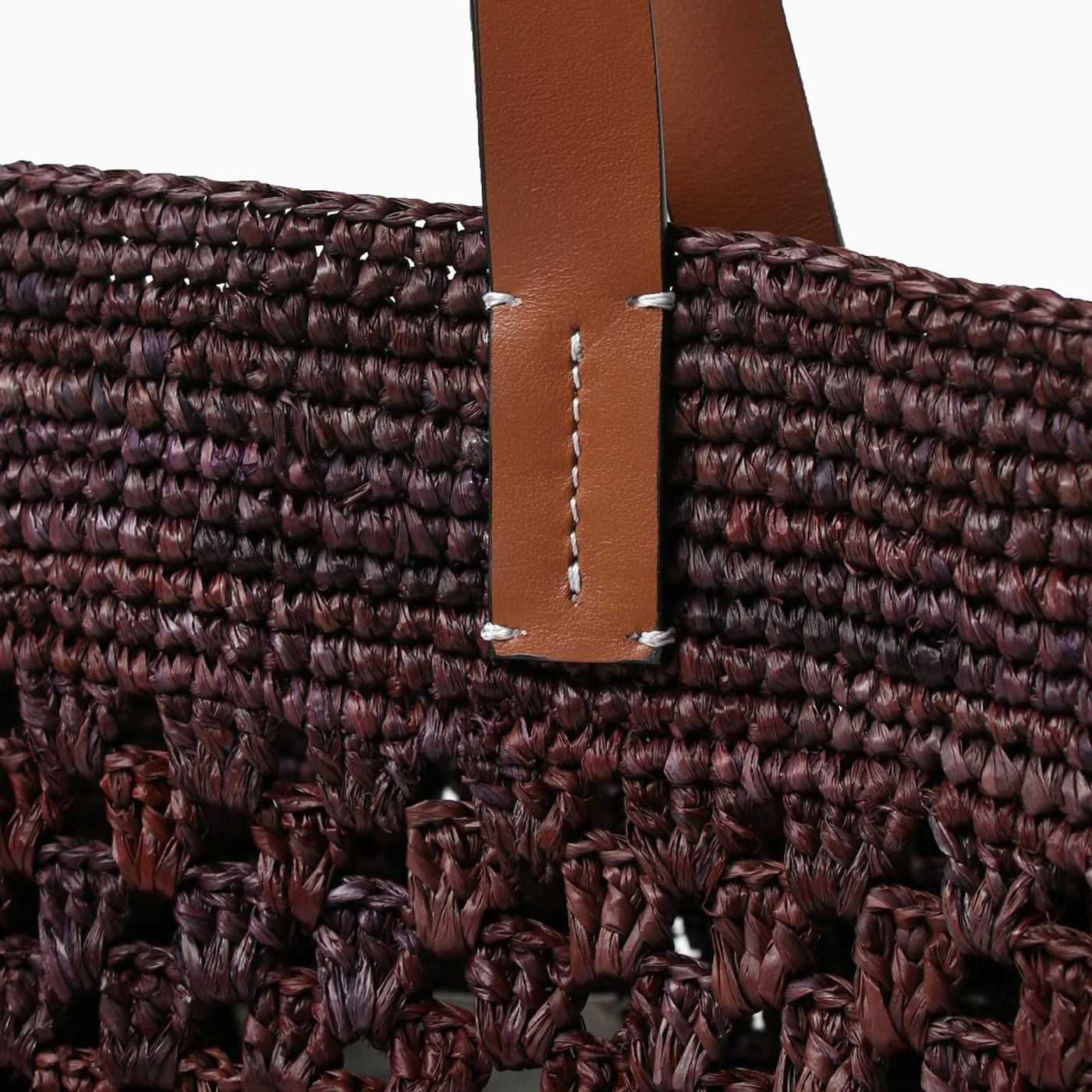 Manebi, Manebí leather and leather in chocolate colored basket bag